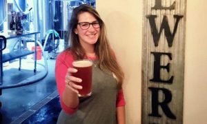 New Smyrna Beach Bartender Lola Tasting a Fresh Beer